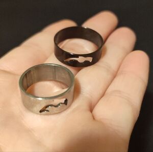 Two Stainless Steel Band Dolphin Rings, Size 7 And 10